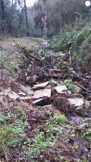 Broken concrete spillway