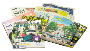 grouping of recyclable office paper, junk mail and paper bags
