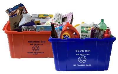orange and blue recycle bins full of recyclables