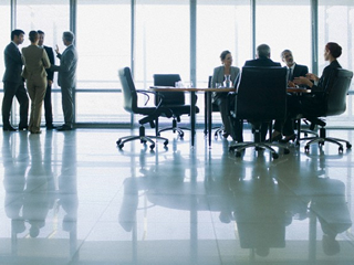 Conference room with people meeting