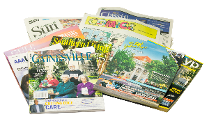 various recyclable newspapers, magazines and phone books