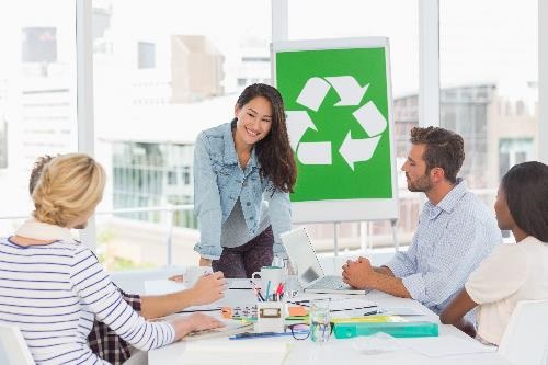 team of coworkers planning recycling tasks