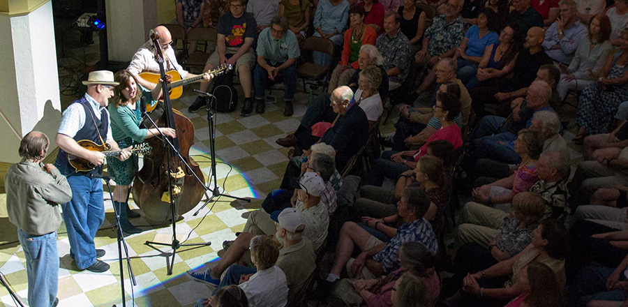 Helen Highwater Stringband plays to audience in the Spanish Court