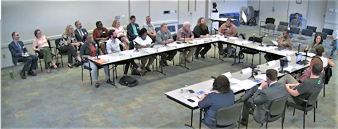 City Advisory Board meeting, people sitting at tables kjb